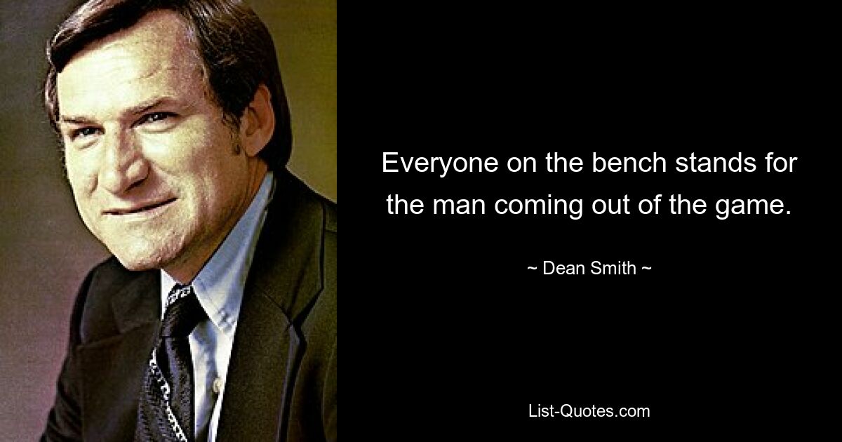 Everyone on the bench stands for the man coming out of the game. — © Dean Smith