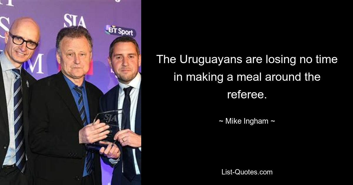 The Uruguayans are losing no time in making a meal around the referee. — © Mike Ingham